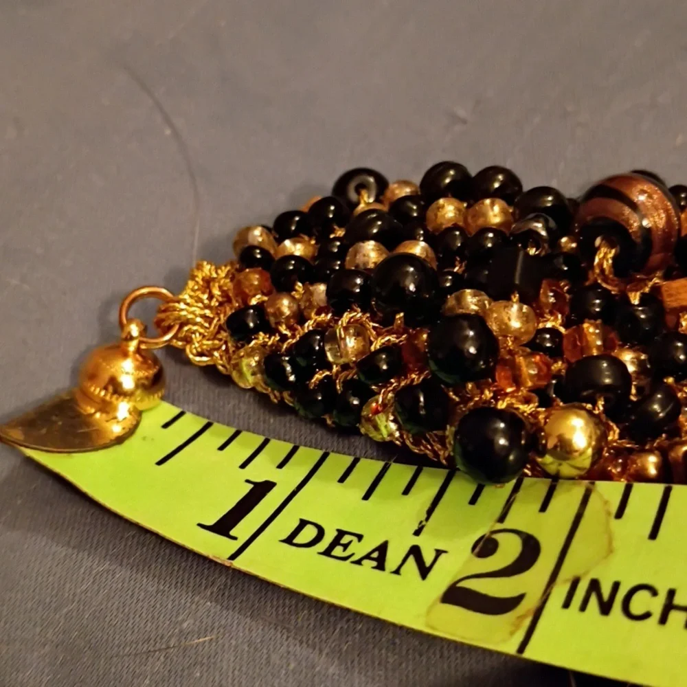 Vintage Black and Gold Beaded Bracelet Sewed With Elastic Thread.